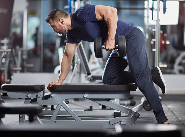 ডাম্বেল রো (Dumbbell Row) : আপনার পেশি গঠনের শক্তি বাড়াতে কার্যকর ব্যায়াম ডাম্বেল রো (Dumbbell Row) : আপনার পেশি গঠনের শক্তি বাড়াতে কার্যকর ব্যায়াম